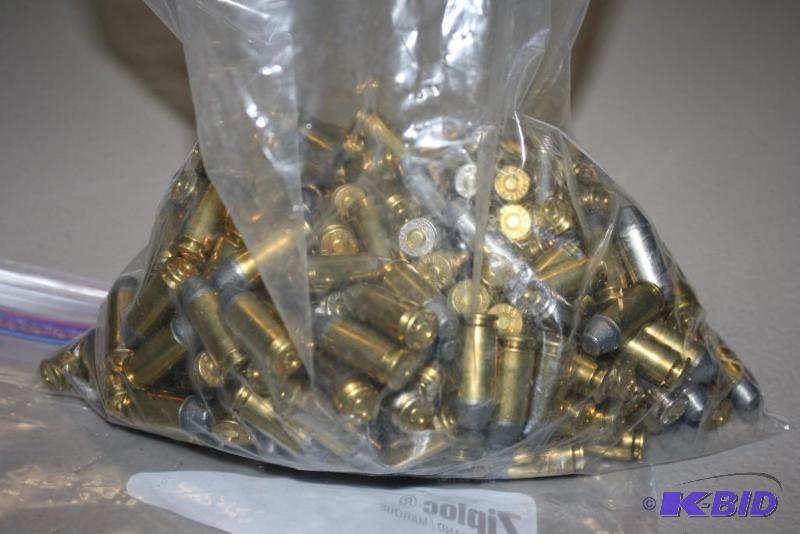 lot 209 image: Bag of 40 CAL S & W Winchester bullets a...