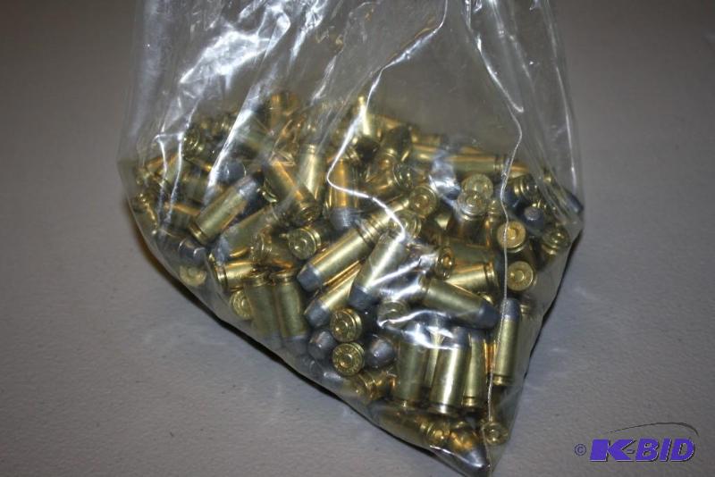 lot 210 image: Bag of 40 CAL S & W Winchester bullets a...