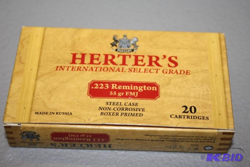 lot 224 image: Herters .223 Remington FMJ ammo app. 20 ct....