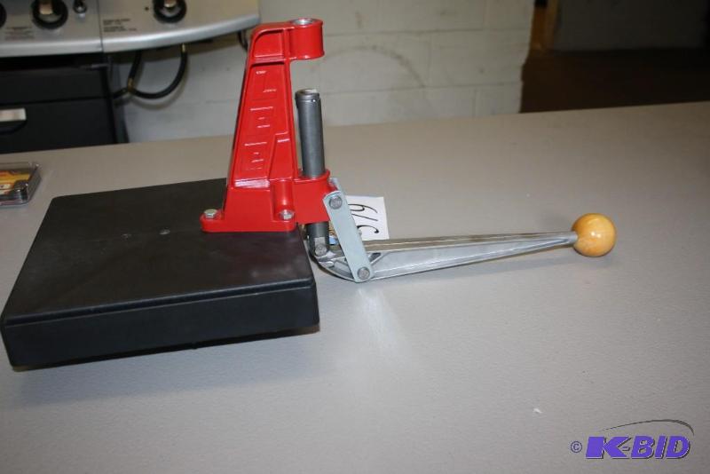lot 579 image: Midway USA Top-Reloading Stand red....