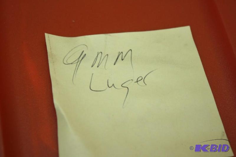 lot 588 image: Bin of 9mm Luger casings app. 900 ct....
