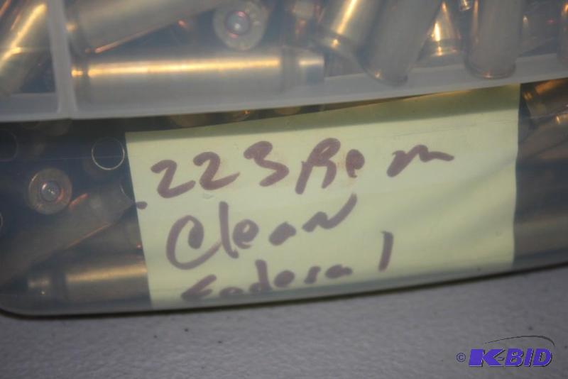 lot 590 image: Bin of .223 Remington casings app. 1200 ct....