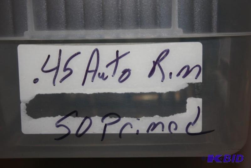 lot 598 image: Bin lot including .45 auto Rim casings, app....