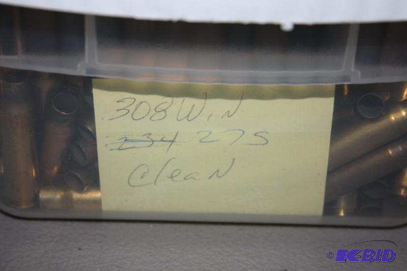 lot 605 image: Bin of 308 Winchester casings app. 275 ct....