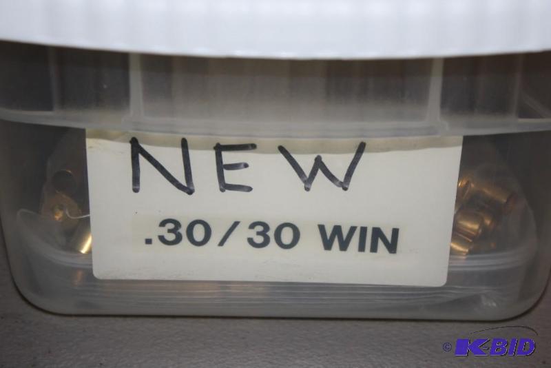lot 609 image: Bin of 30-30 Winchester casings app. 300 ct....