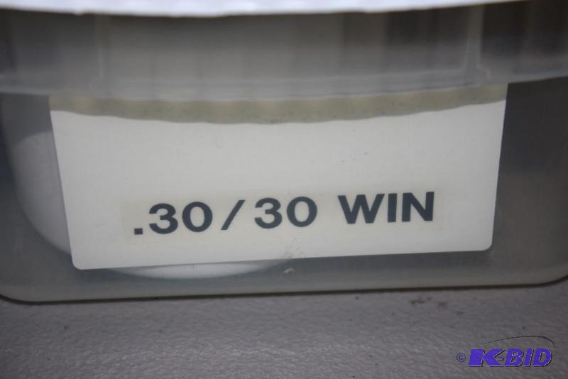 lot 610 image: Bin of 30-30 Winchester casings app. 200 ct....