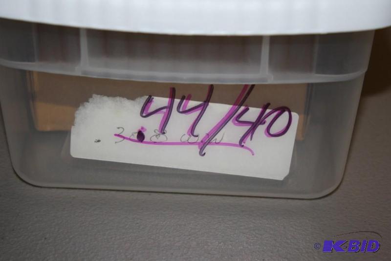 lot 613 image: Bin of 44-40 casings app. 125 ct....