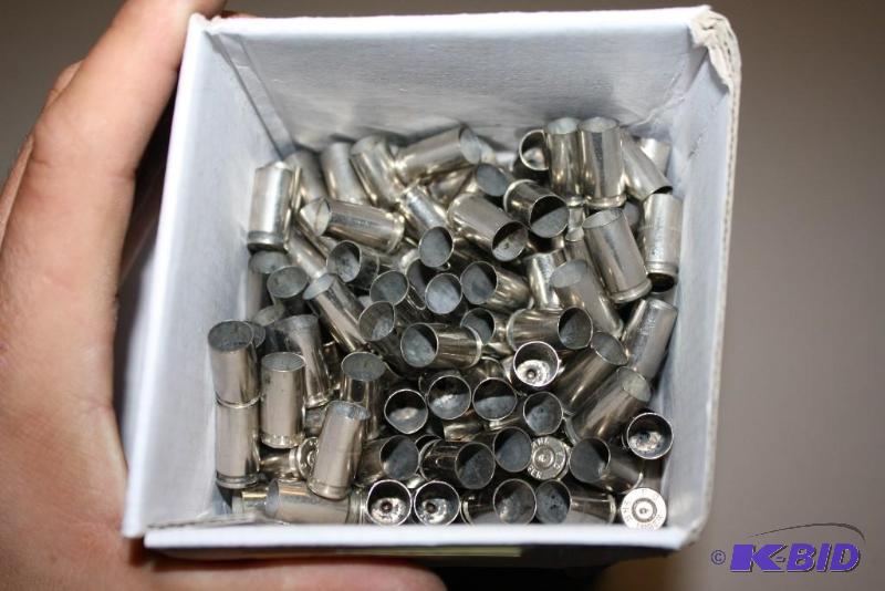lot 642 image: Box of 9mm Luger nickel casings app. 700 ct....