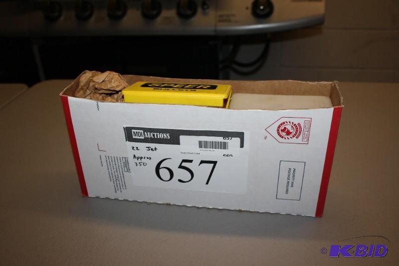 lot 657 image: Box of 22 Jet casings app. 350 ct....