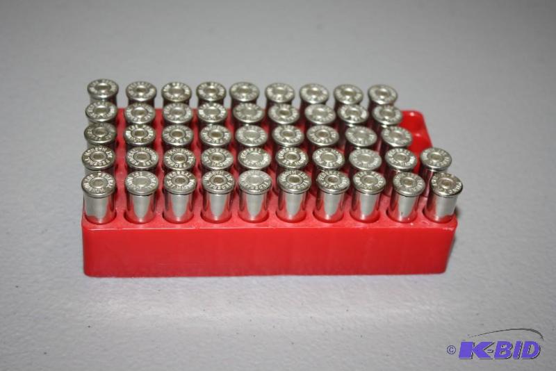 lot 663 image: Container of 375 Mag casings app. 45 ct....