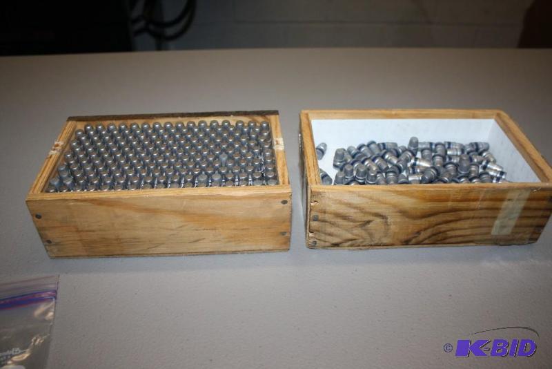 lot 670 image: Box lot of (2) 10.71 x 19.81 bullets app. 72...