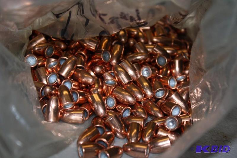 lot 675 image: Bag of 9mm bullets app. 430 ct....