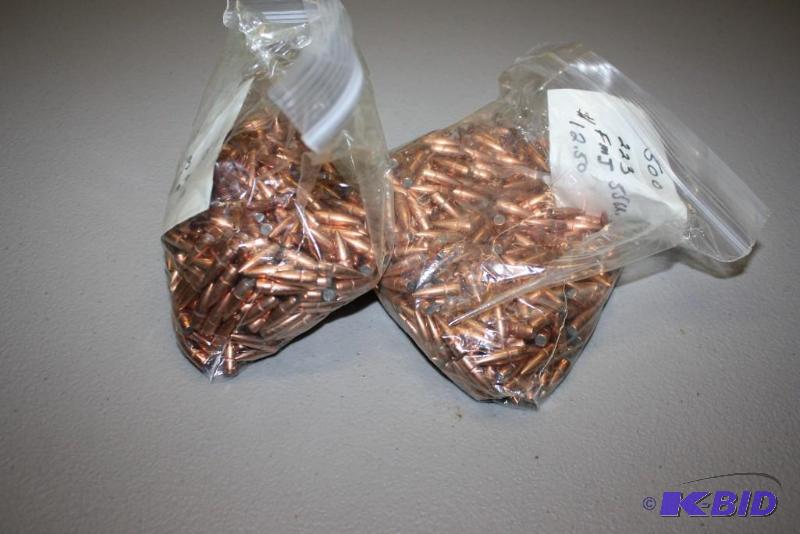 lot 676 image: Bag Lot of (2) 223 FMJ 55 Grain bullets app....