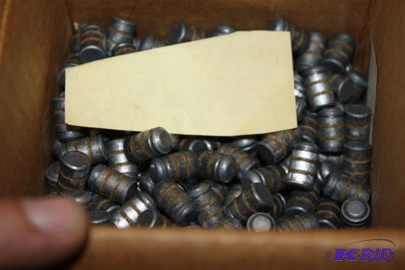 lot 740 image: Box of 28 Cal 148 Grain Bevel Base bullets a...