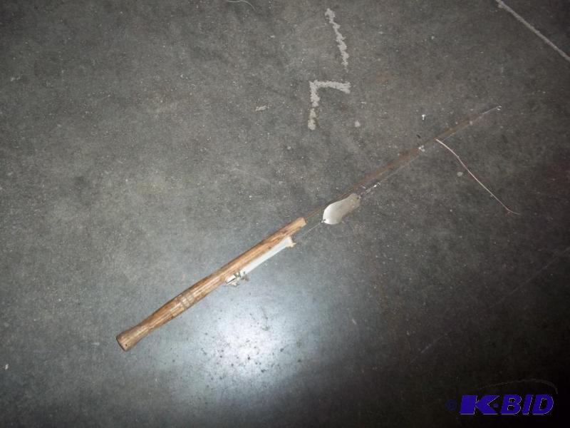lot 103 image: Vintage ice fishing pole...