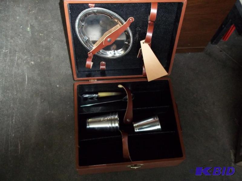 lot 104 image: Martini mixer case with some accessories....