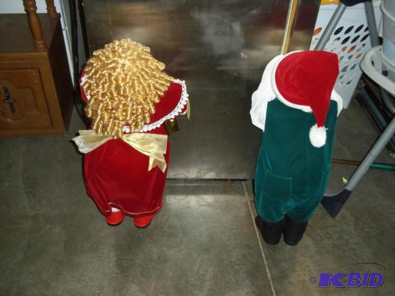 lot 118 image: Hiding Christmas Boy and Girl...