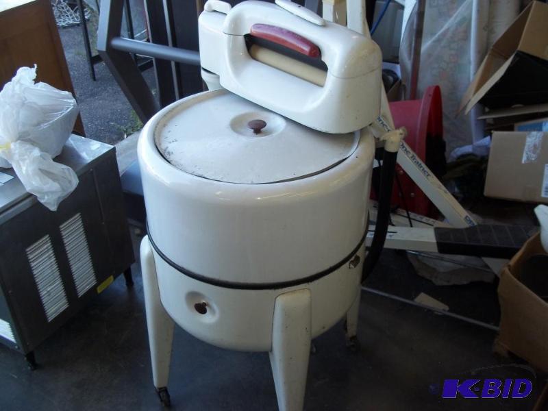 lot 12 image: Antique wringer washing machine...