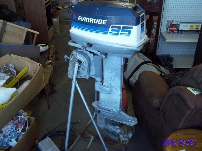 lot 13 image: 35 HP Evinrude long shaft motor with Controls...