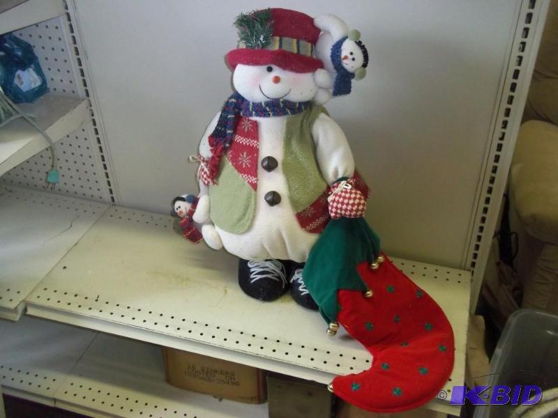 lot 227 image: Snowman with stocking...