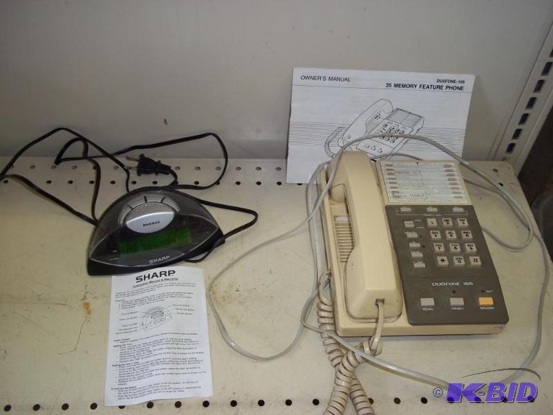 lot 237 image: Phone and answering machine...