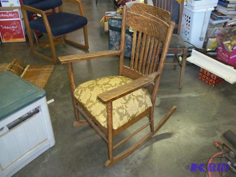 lot 27 image: Wood Rocking Chair. some damage on top...