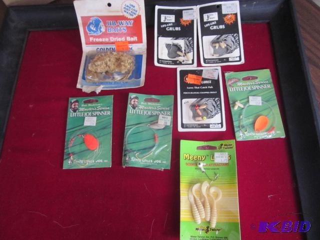 Lot of mixed Grubs and fishing lures in packa...