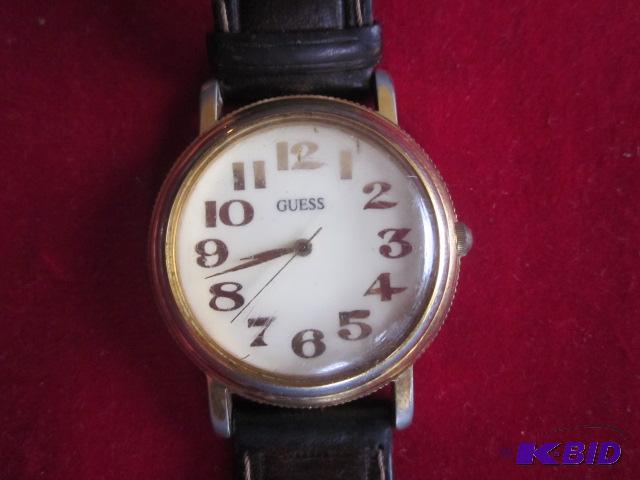 Vintage Gold tone Guess watch with leather ba...