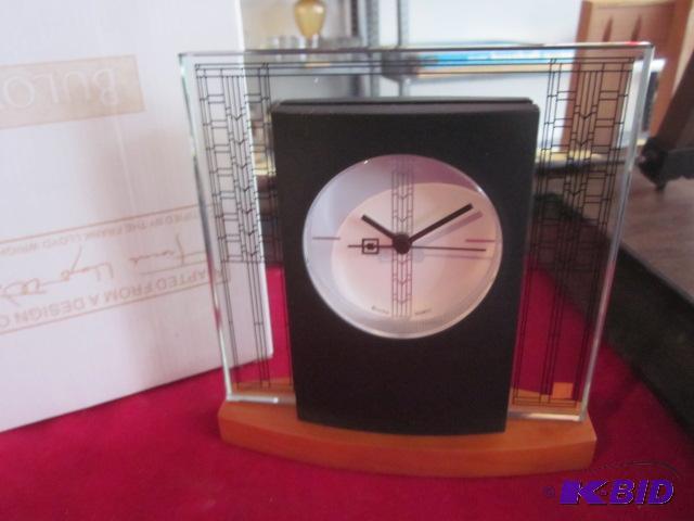 Bulova glass and wood mantel clock.&nbsp Ada...