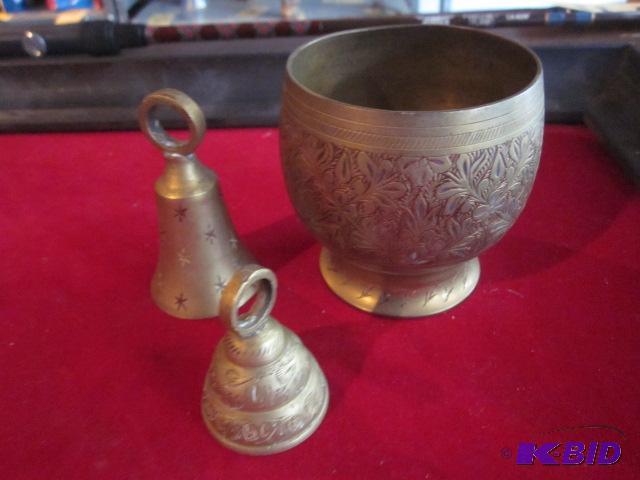 Lot of brass bells and cup.&nbsp...