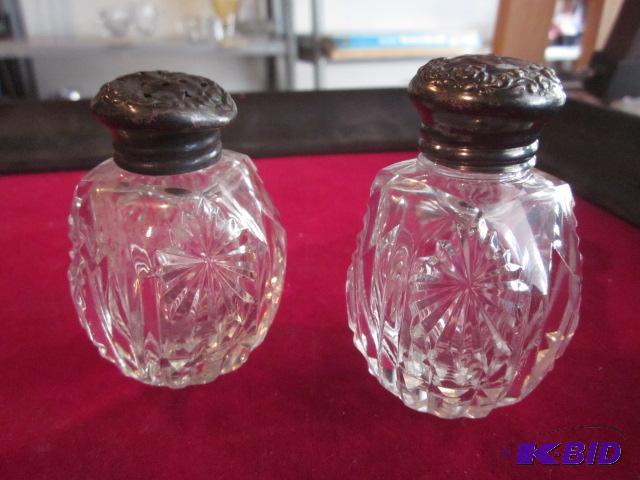 Pair of cut crystal salt and pepper shakers w...