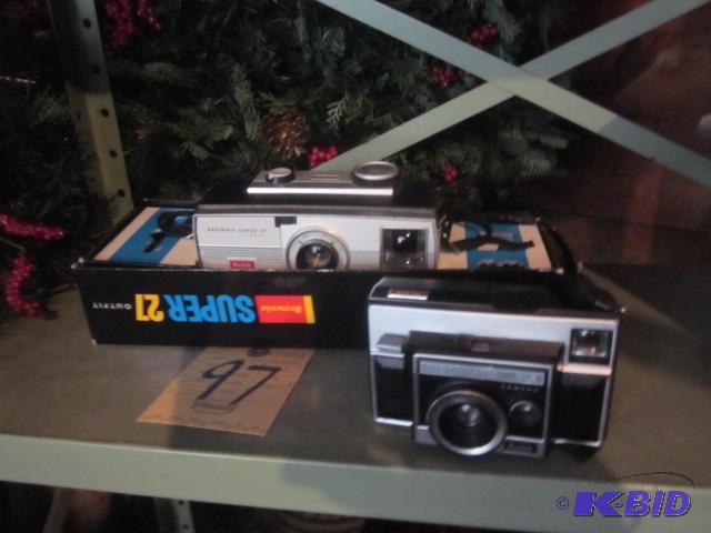 Pair of vintage Kodak cameras, including Brow...