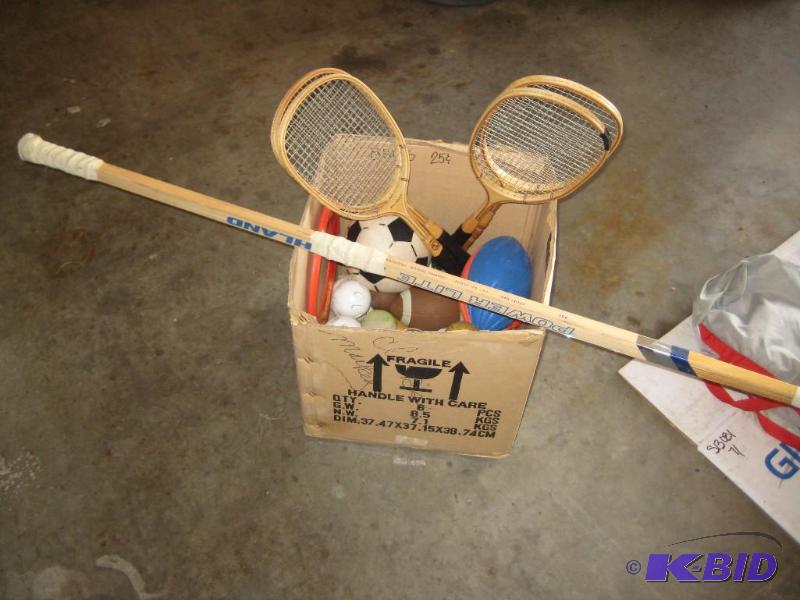 lot 28 image: Assorted Sporting Goods including Hockey Stick