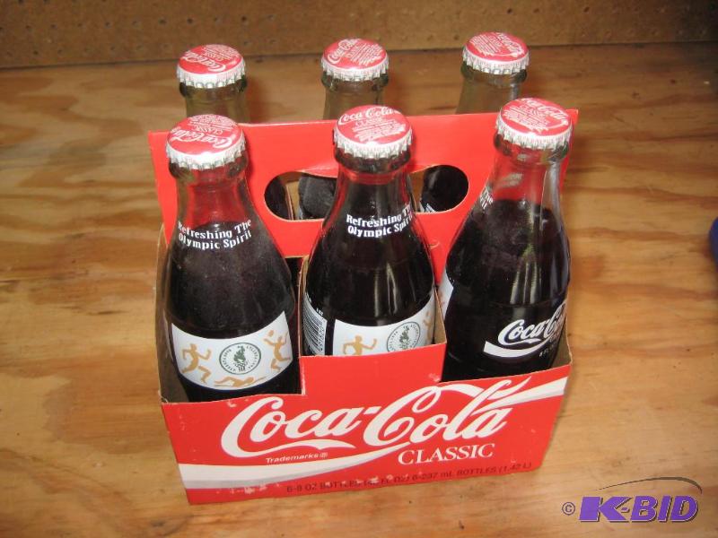 lot 29 image: Coca Cola Bottles (6 pack) Olympics in Georgia