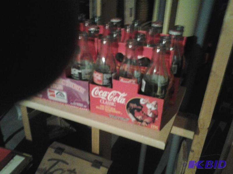 lot 30 image: Empty Coke Bottles (older)