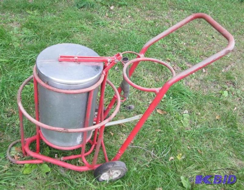 lot 147 image: Styainless steel milking can on wheels...