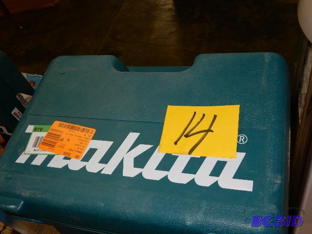 lot 14 image: Makita 4" Angle Grinder with case and on...
