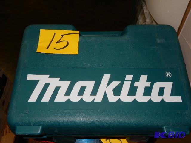 lot 15 image: Makita 4" Angle Grinder with case and on...
