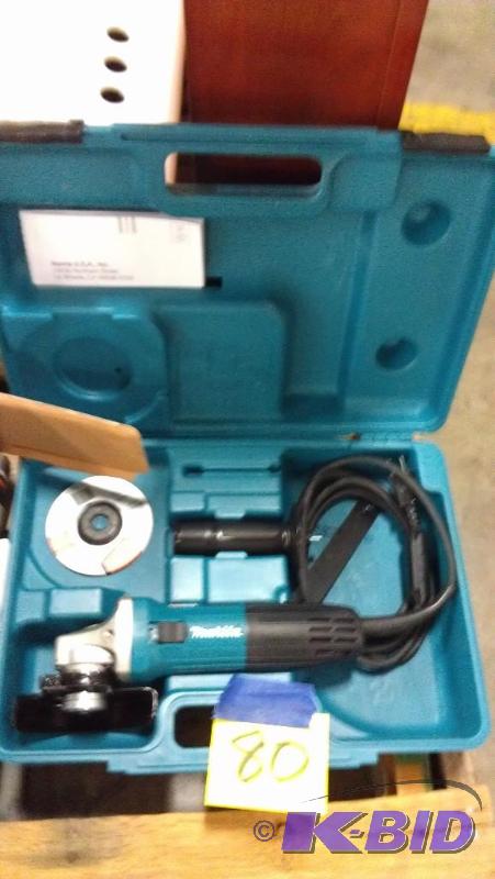 lot 80 image: Makita 4" Angle Grinder with case and on...
