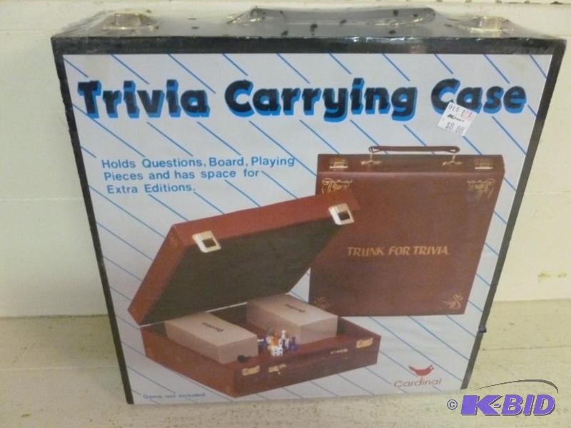 lot 155 image: Trivia Carrying Case, brand new in a sealed p...