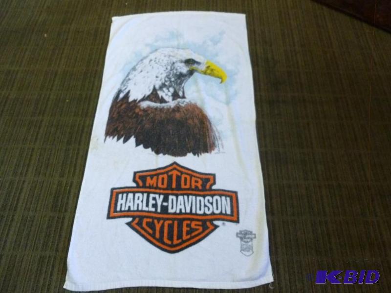 lot 17 image: Collectible Harley Davidson beach towel that ...