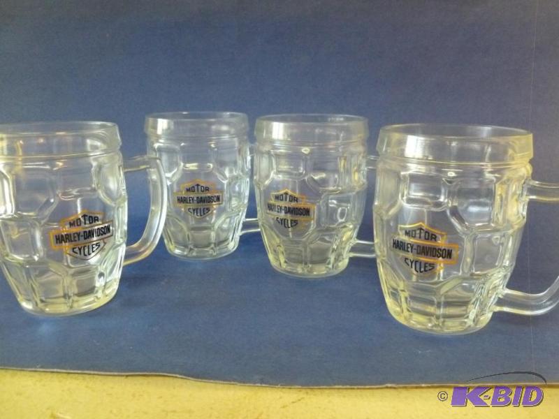 lot 18 image: A matching set of four collectible Harley Dav...