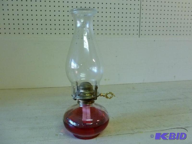 lot 24 image: Large oil lamp that measures 13" H, grea...