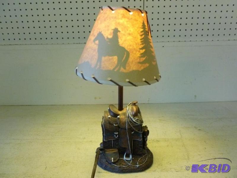 lot 31 image: Beautiful molded resin saddle dresser lamp wi...