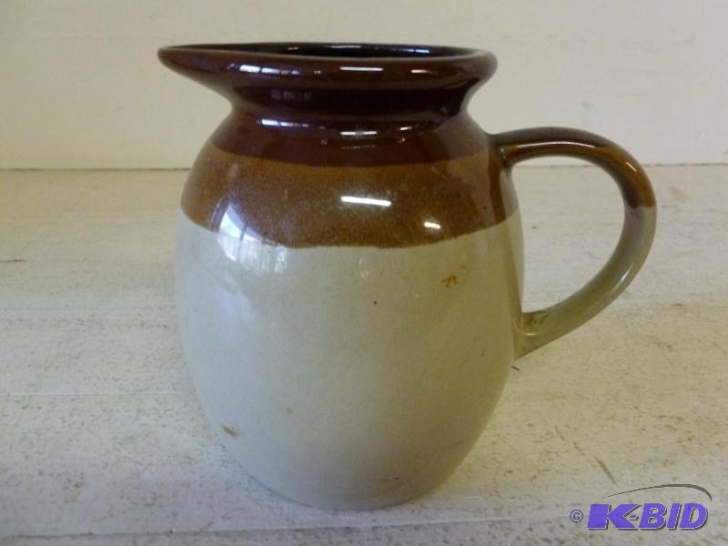 lot 35 image: Beautiful stoneware buttermilk pitcher that m...