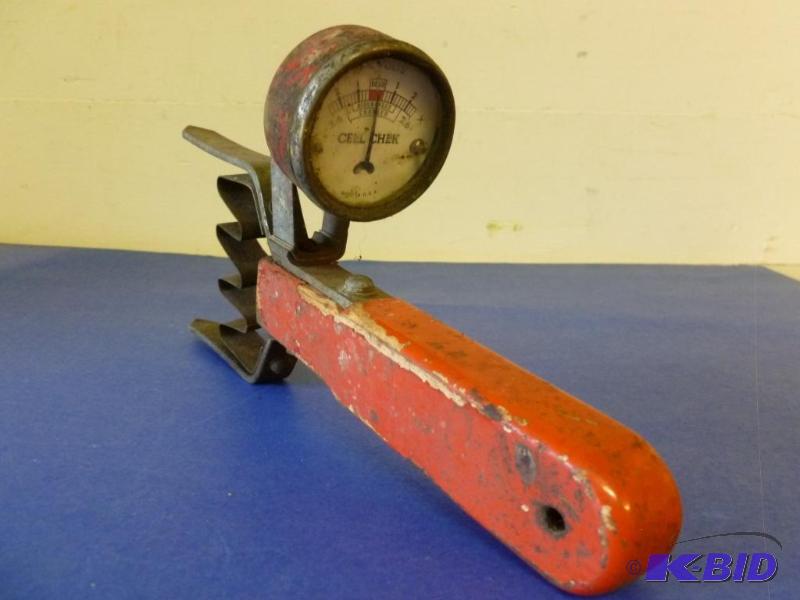 lot 45 image: Vintage red wood handled cell check mechanics...