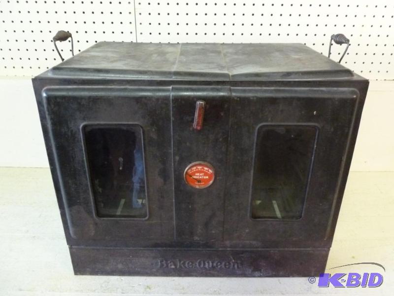 lot 7 image: Antique Bake Queen all metal stove top oven t...