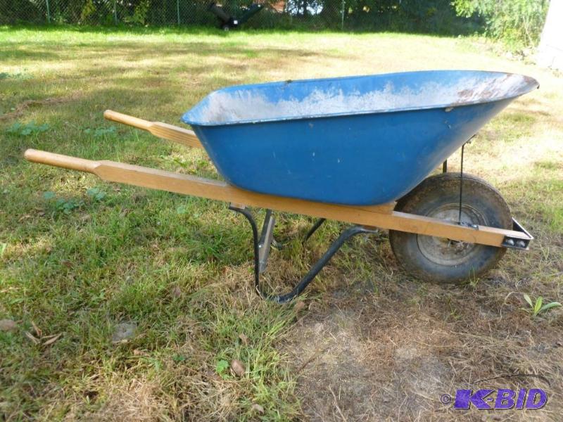 lot 8 image: Large heavy duty wheel barrow, tire holds air...
