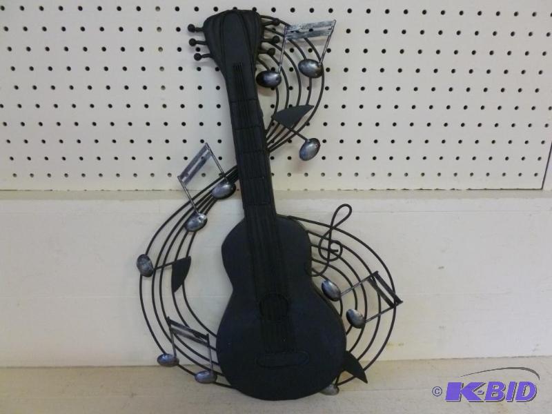 lot 96 image: Large heavy gage metal guitar and musical not...