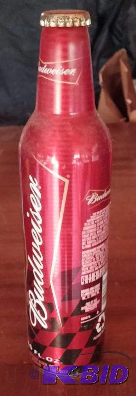 lot 13 image: NASCAR #8 Dale Earnhardt JR Metal Collectable Beer Bottle